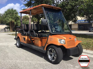 Orange Tomberlin 6 Passenger Golf Cart palm coast golf cart rental, golf cart rentals